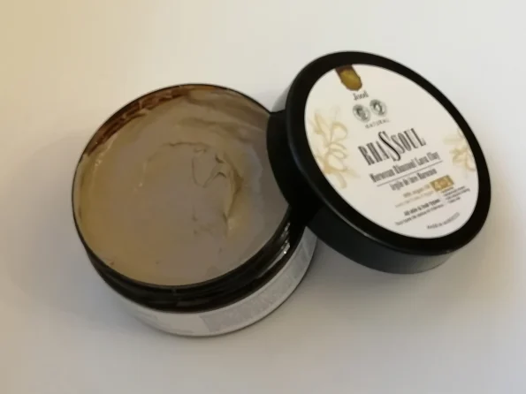 Glimpse of Luxury: Open Bottle of Black Soap With Argan Oil